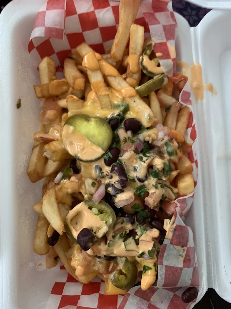Loaded taco fries with queso, black beans and jalapenos at Don Taco Calgary